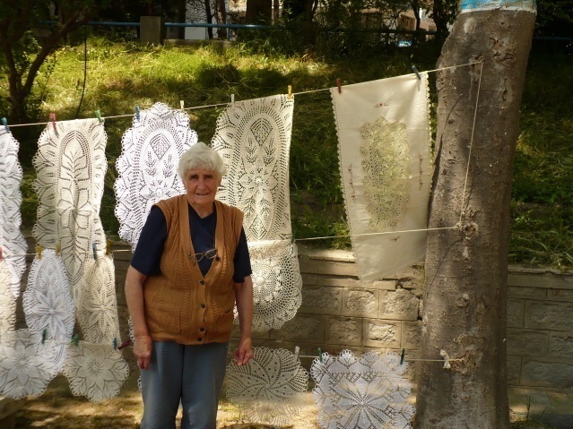 Woman in Old Town of Sozopol with Embroidery / Photo credit Jane Martin 