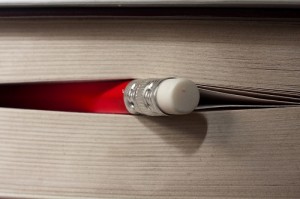 Macro of red HB pencil peeking through a book by Horia Varlan on Flickr