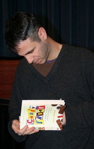 Steve Almond signs a copy of Candy Freak / photo by Jonathunder, via Wikipedia Commons